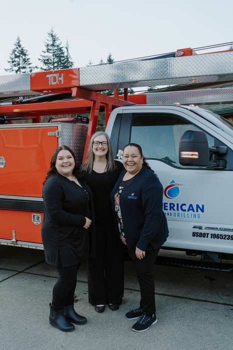 Some of our team members in front of a truck