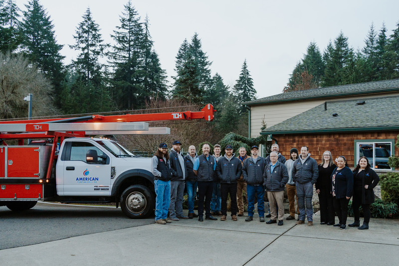 Our team in front of one of our large service trucks